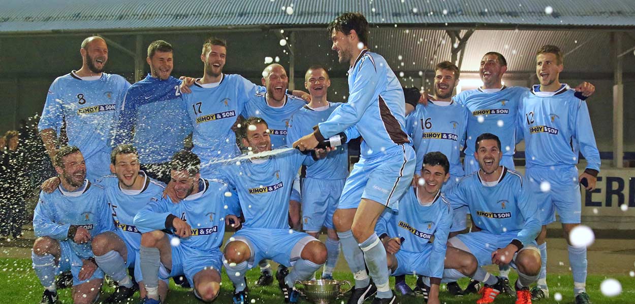 Lifting the football trophy